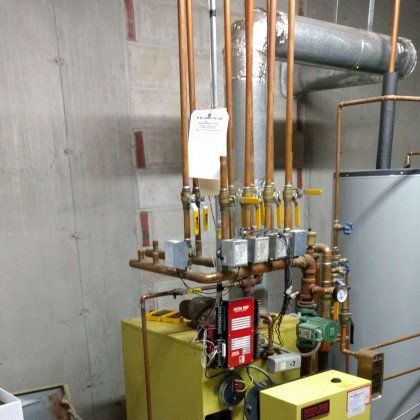 A Well Cleaned Oil Tank — Acton, MA — Colonial Comfort