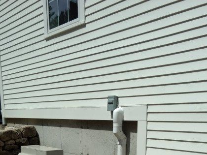 A Condenser Below The House — Acton, MA — Colonial Comfort