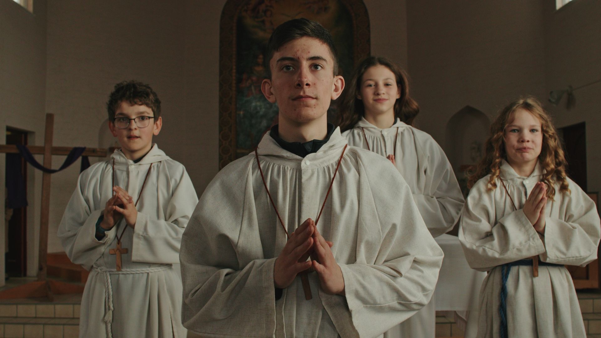 A group of women are playing soccer on a field.