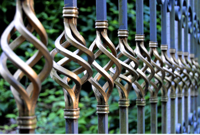 Beautiful, ornamental steel fence on Wakefield estate.