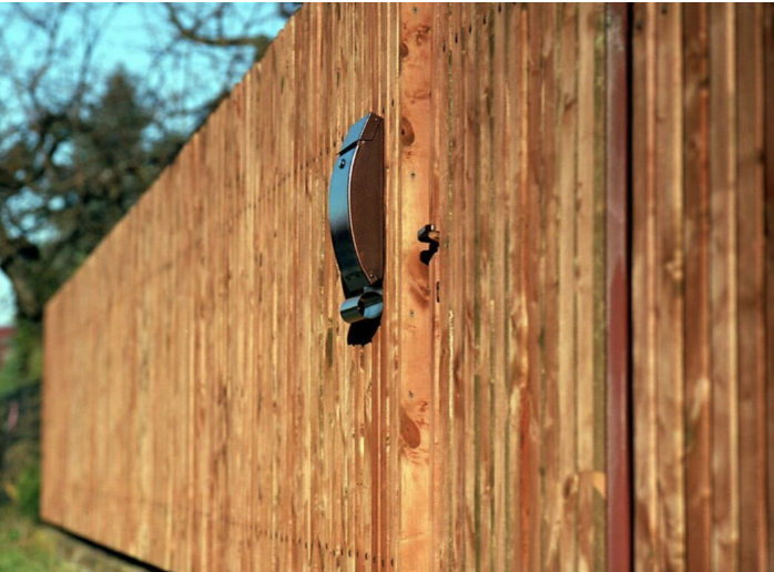 Wooden privacy fence with gate on Wake Forest, NC property.