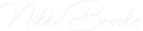 Light gray script logo reading “Nikki Brooke” on a white background