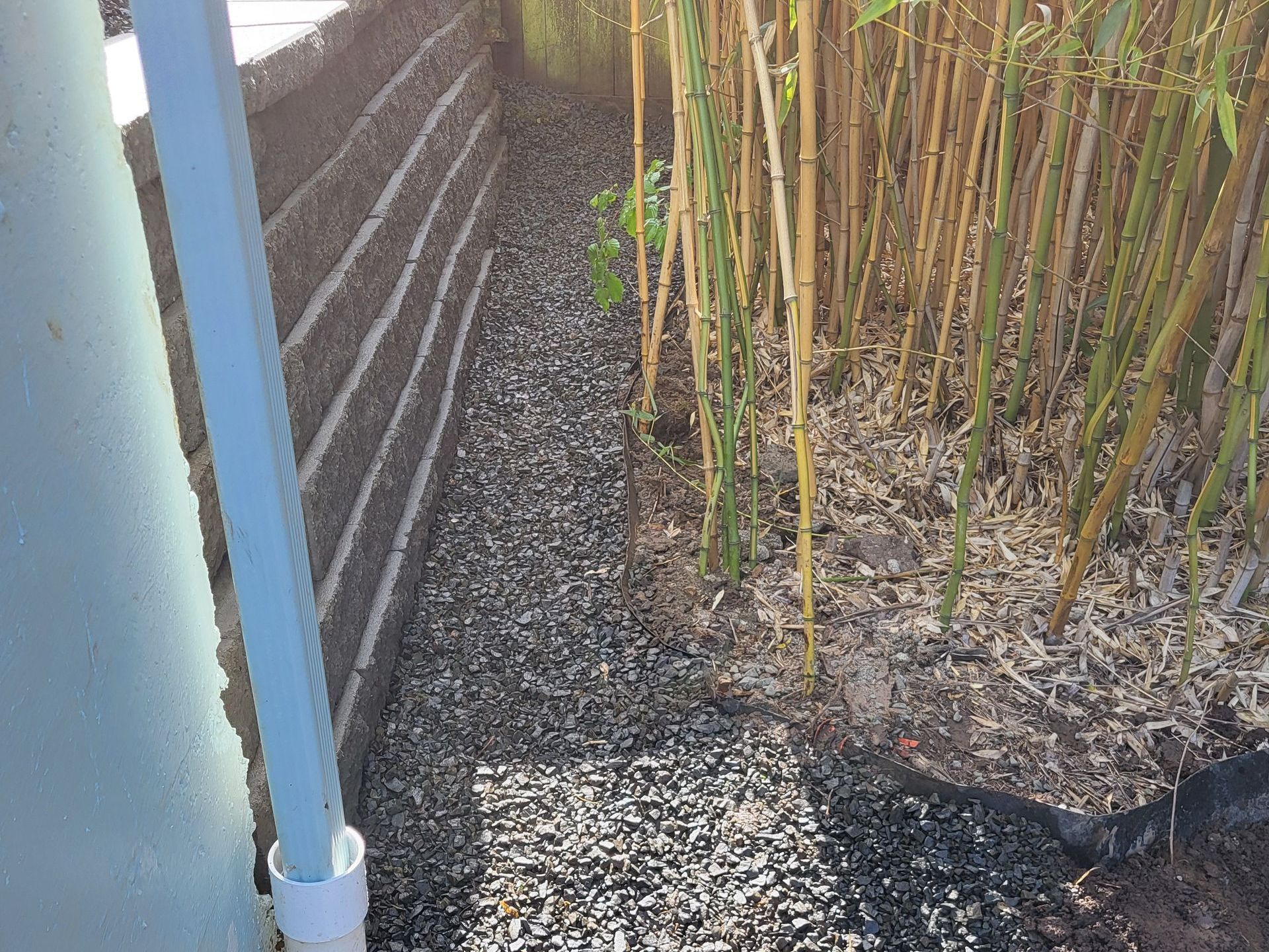 New retaining wall and gravel