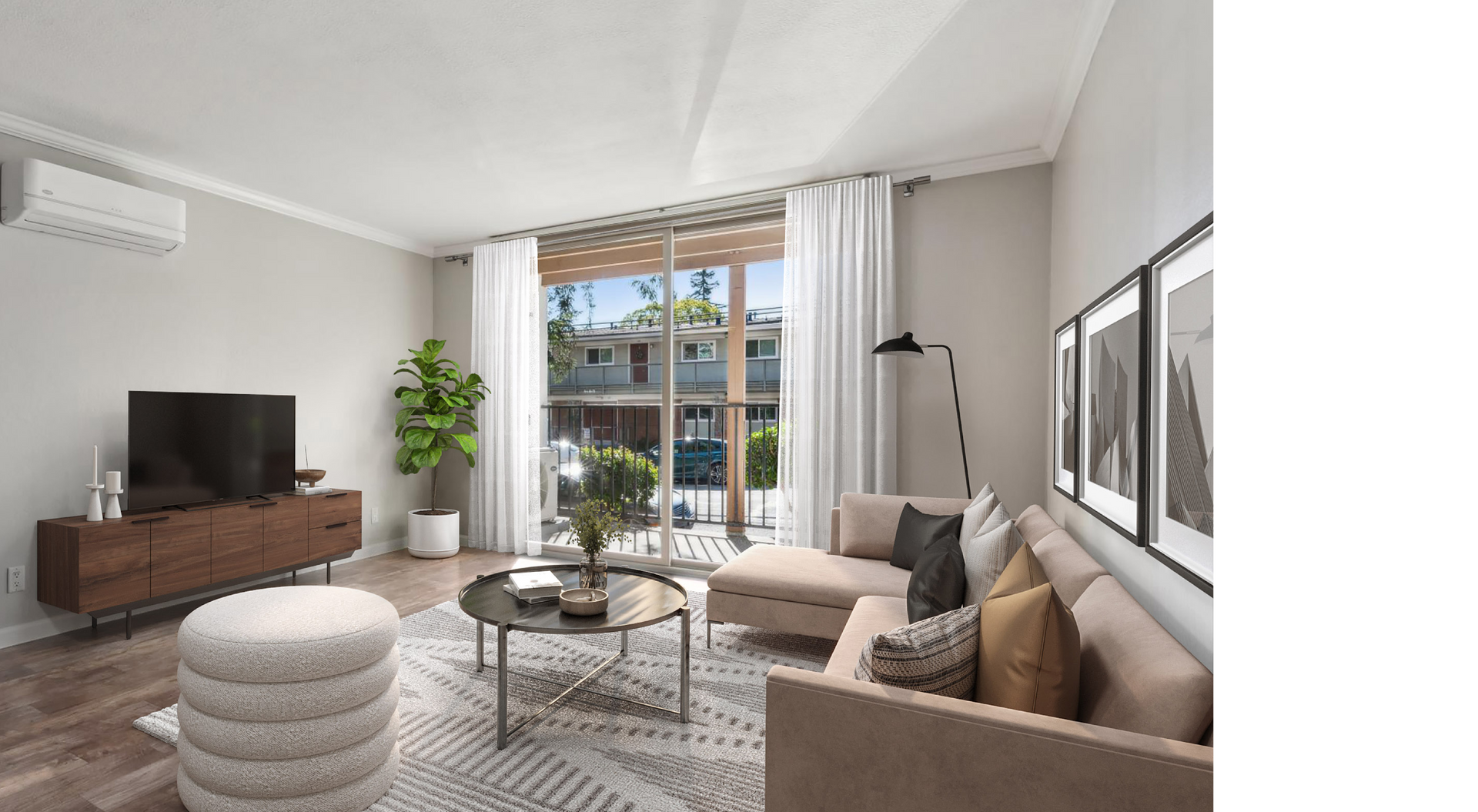 Living room with neutral colors, TV, sofa, and glass door.