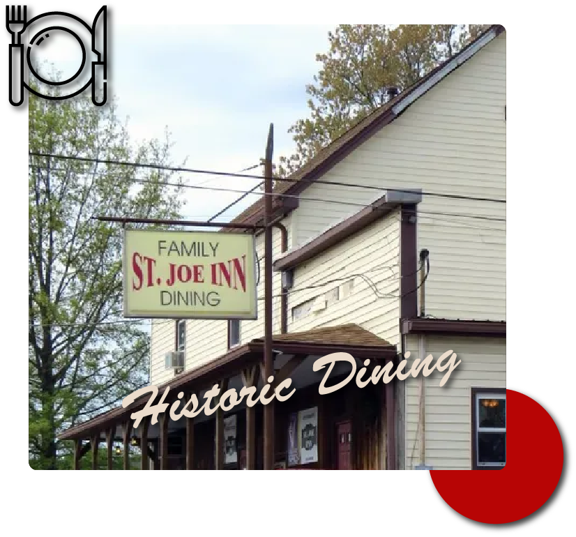 A white building with a sign that says family st. joe inn dining