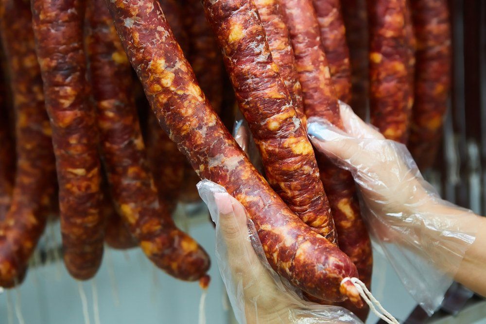 Smoked Sausage Hanging — Byron Bay Pork & Meats Butchery in Mullumbimby, NSW