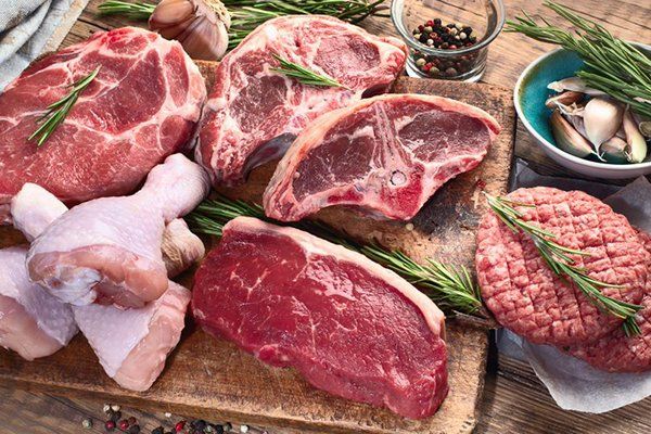 Various Fresh  Meats on a Chopping Board— Byron Bay Pork & Meats Butchery in Byron Bay, NSW