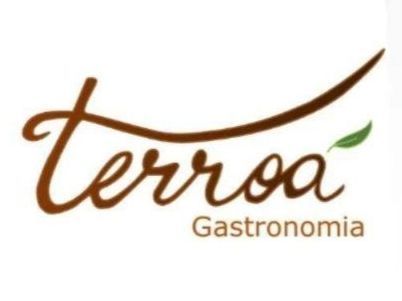 Um logotipo para a Terra Gastronomy com uma folha verde