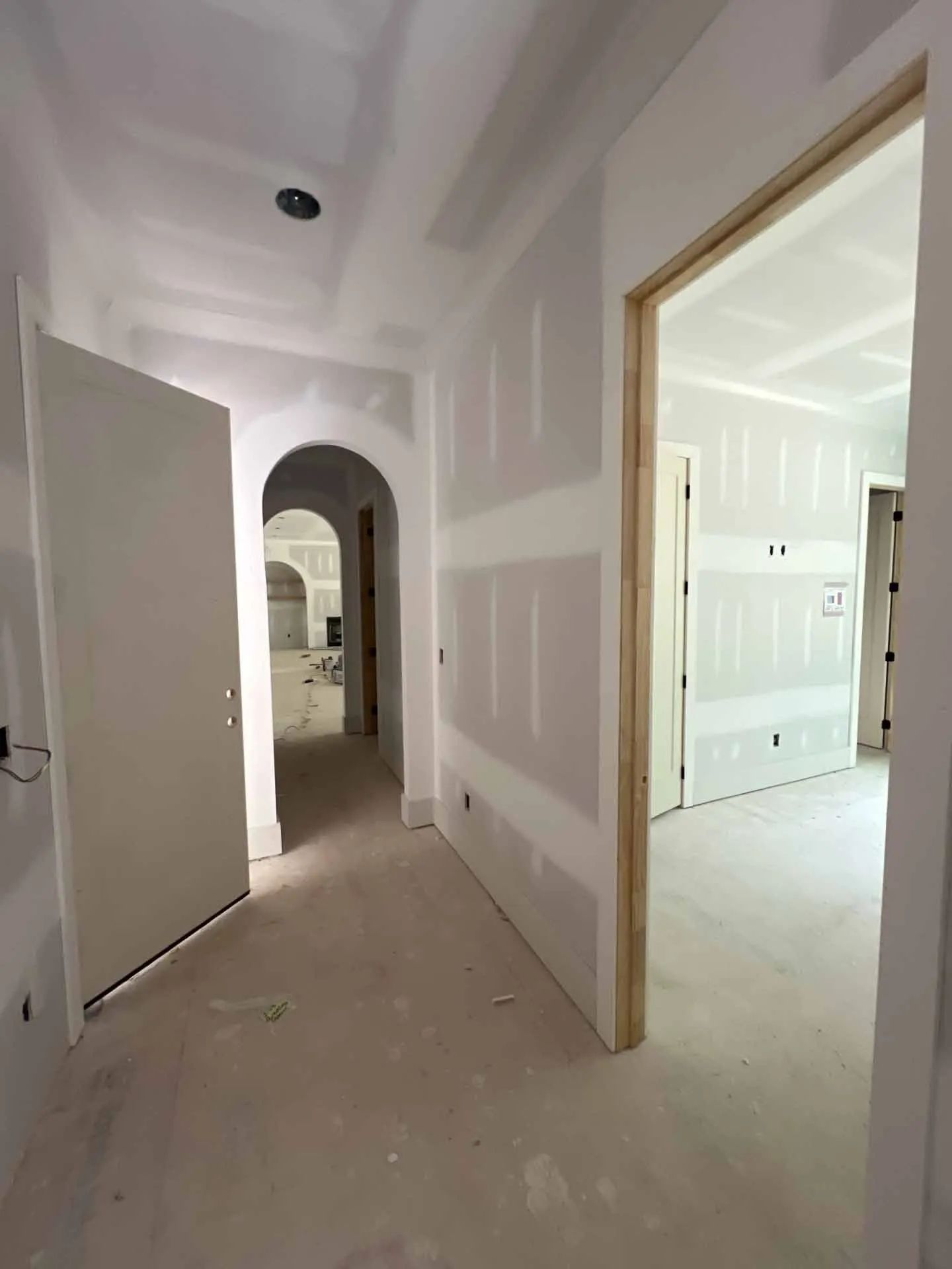 A hallway in a house that is being remodeled.