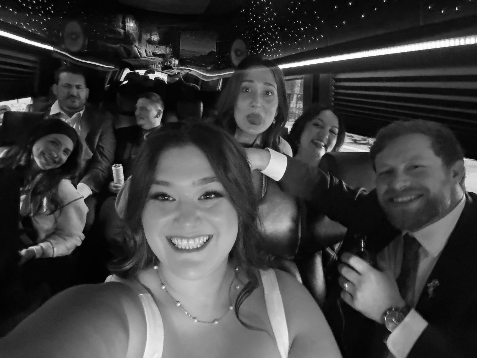 Happy clients inside Sprinter Van for a Weddings