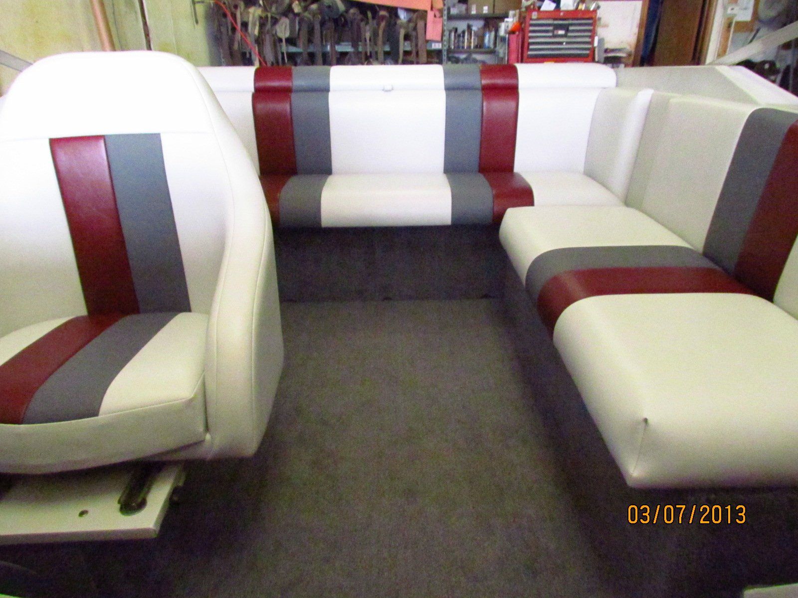 White, gray, and burgundy leather boating interior