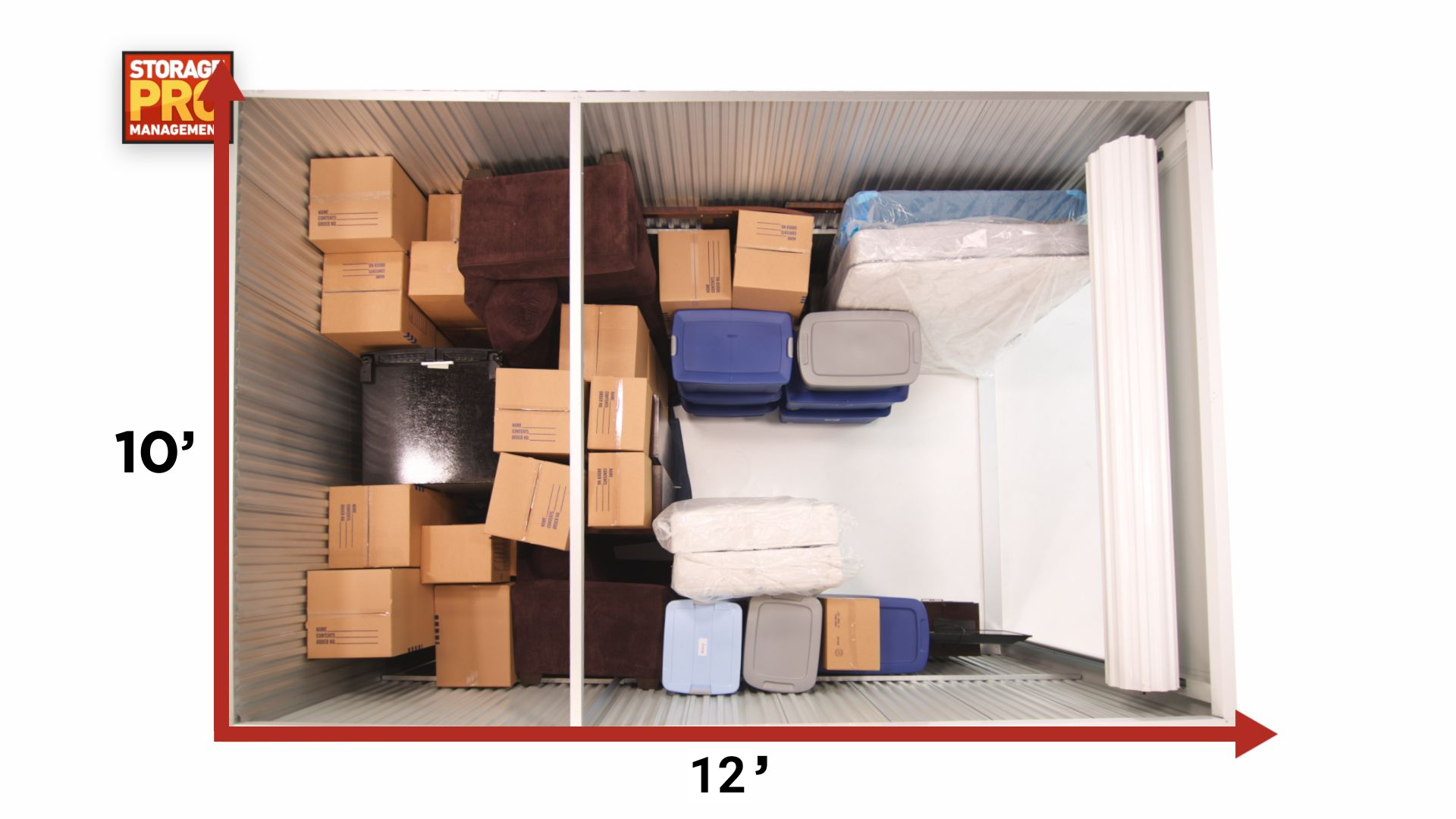 Interior view of a 10x15 storage unit packed with boxes, furniture, and a mattress, showing storage capacity.