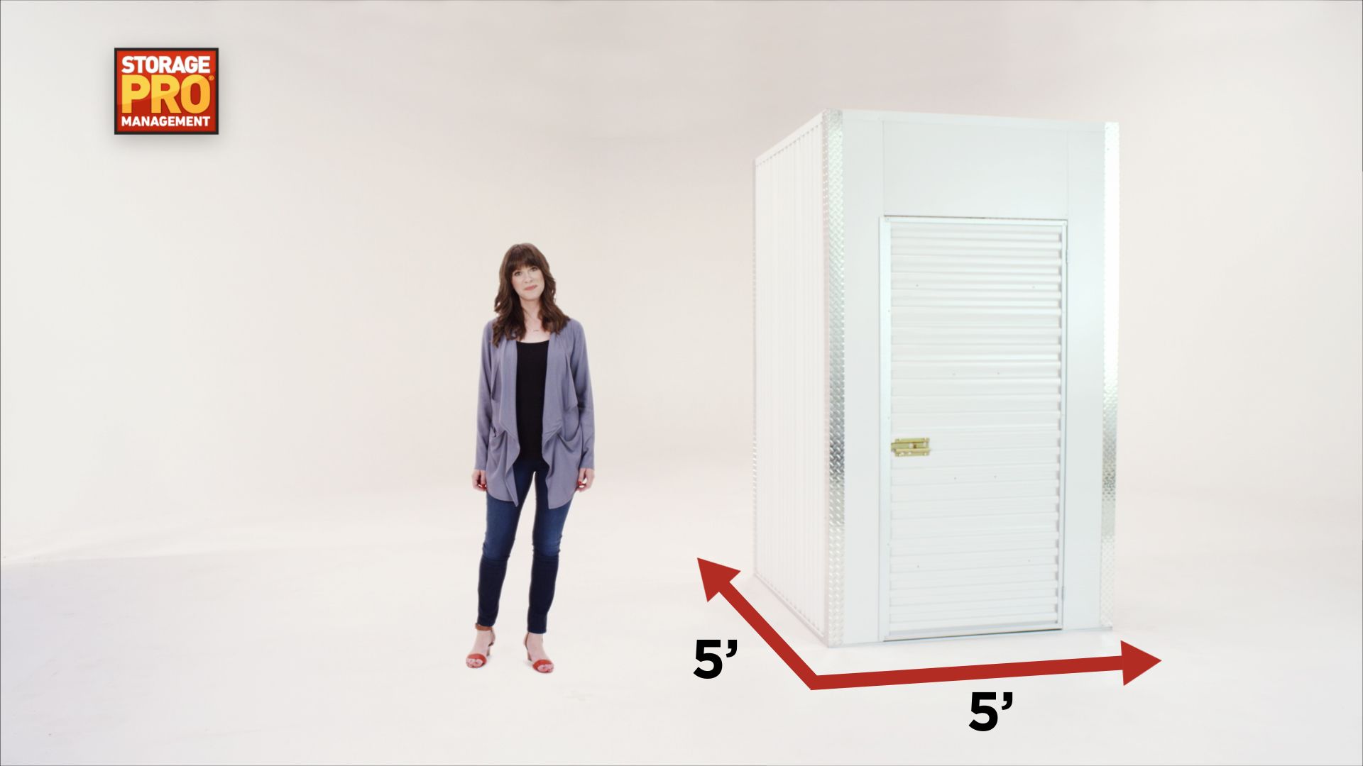 Woman standing next to a 5x5 foot storage unit. Red arrows mark unit's dimensions.