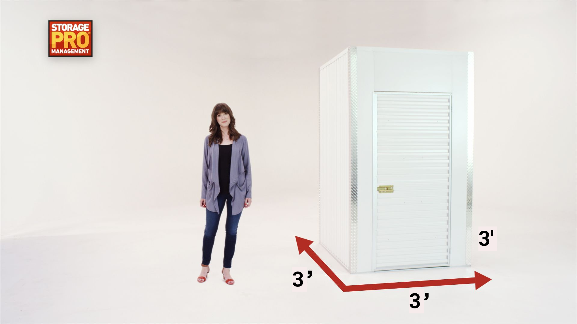Woman standing next to a 5x5 foot storage unit. Red arrows mark unit's dimensions.