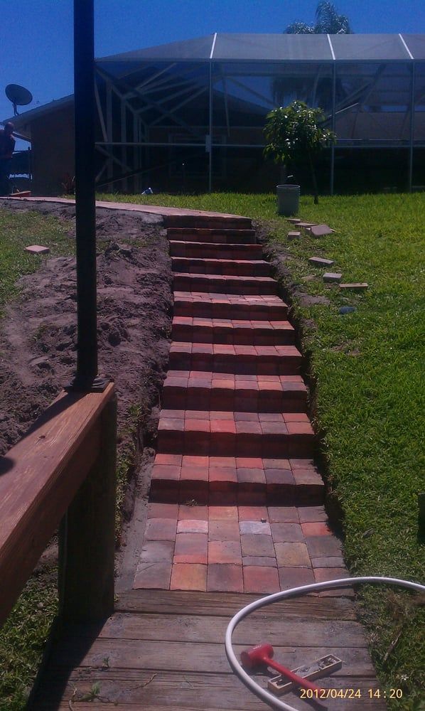 installing brick walkway and stairs