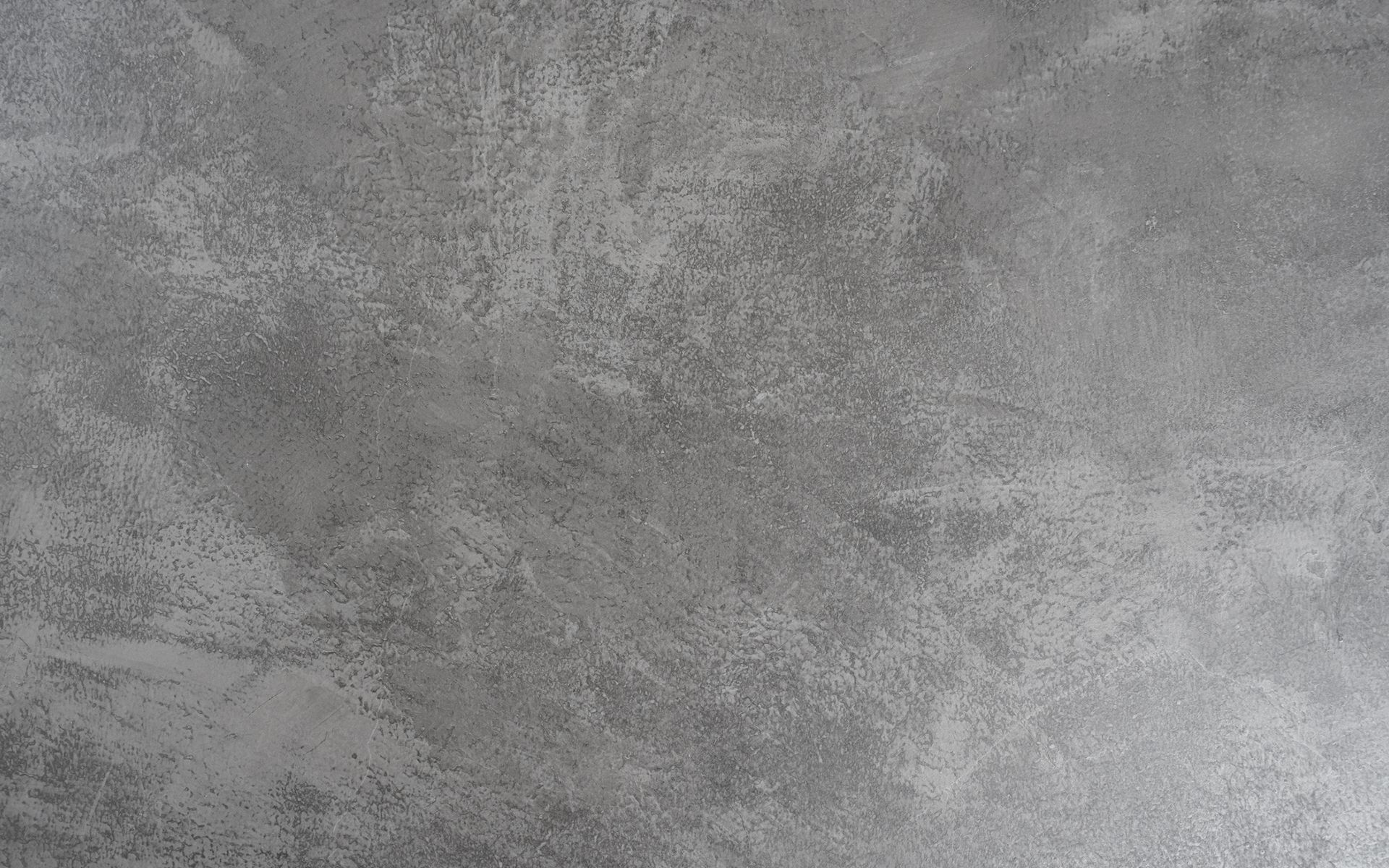 A close up of a gray concrete wall texture.