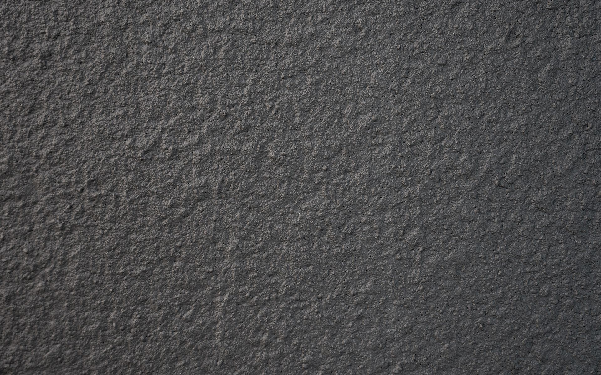 A close up of a black carpet texture.