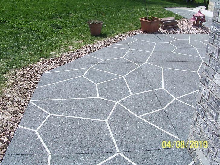 A patio with a geometric pattern painted on it