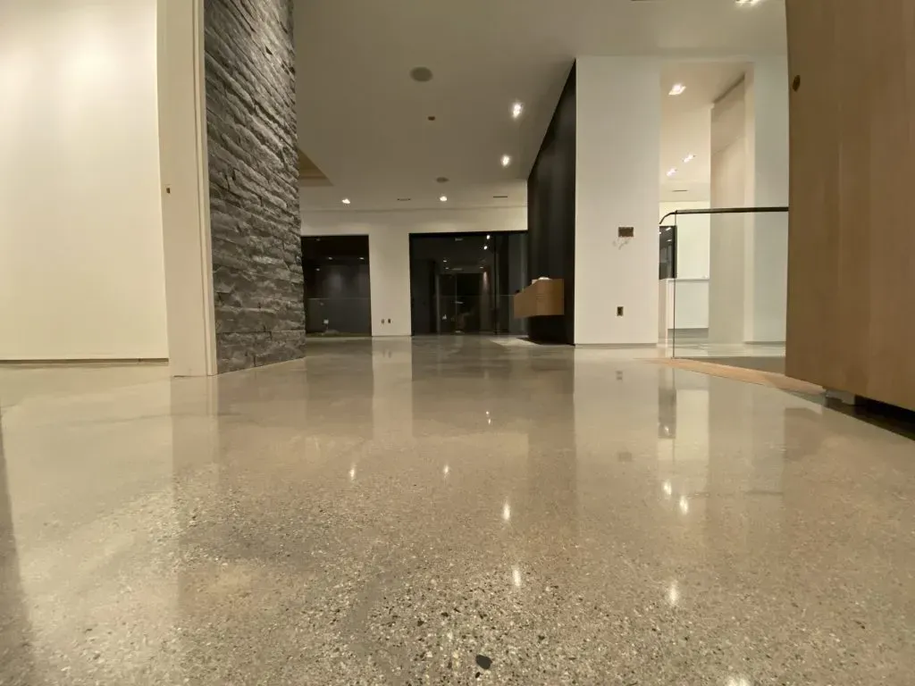 A concrete walkway is being built in a garden