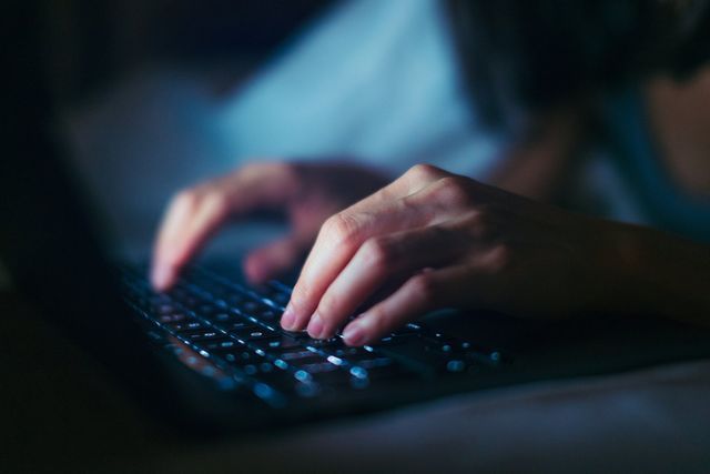 Woman Typing on the keyboard