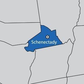 Map highlighting Schenectady County, New York, colored blue, with a white dot indicating the city of Schenectady.
