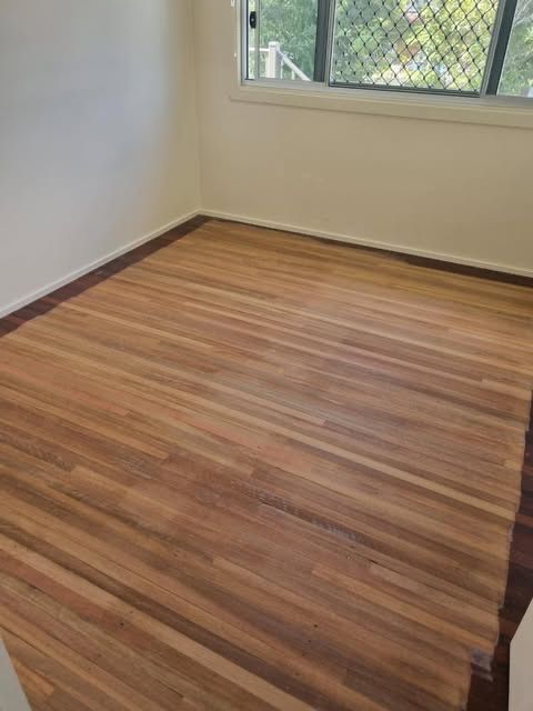 A Room With Sanded Wooden Floors— European Floor Sanding In Mount Louisa, QLD