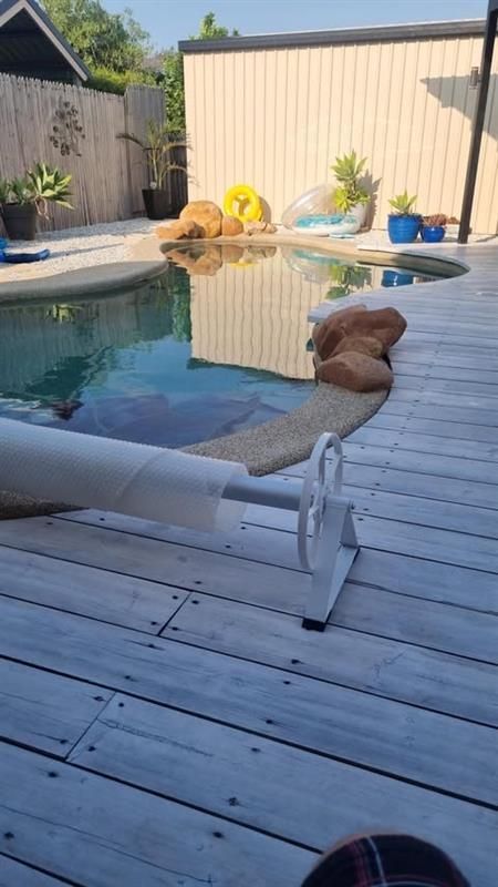 A Deck Next To A Pool — European Floor Sanding In Mount Louisa, QLD