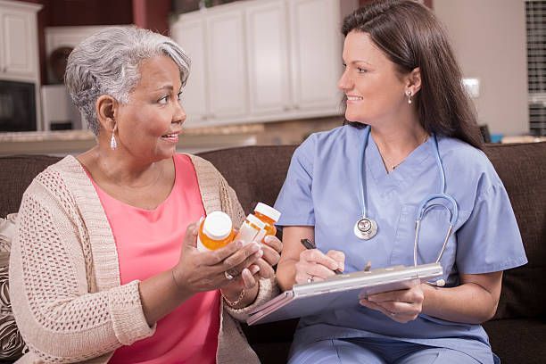 Nurse Discussing Medications To Woman — Wilkes-Barre, PA — Community Health Center