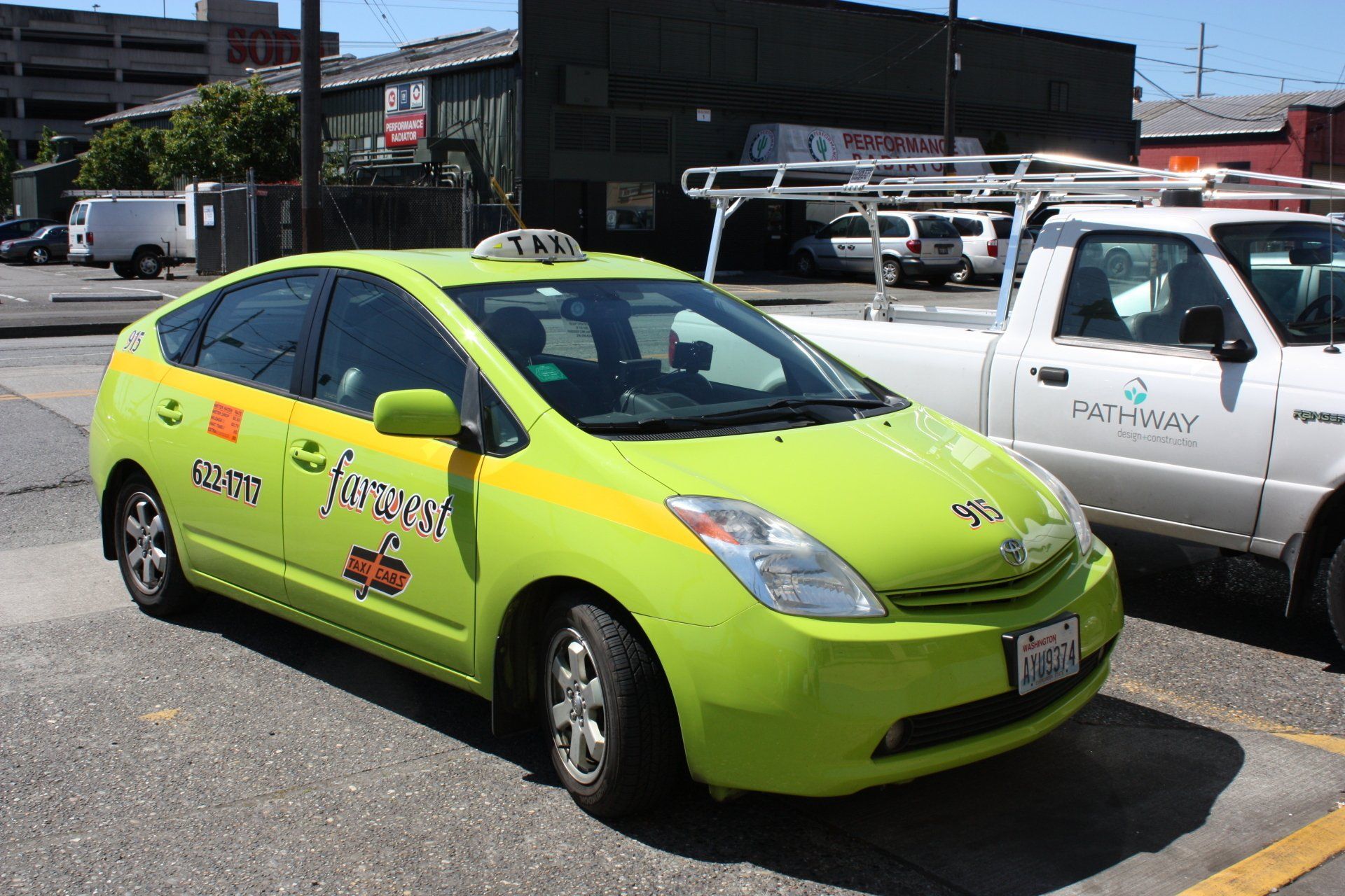 Taxi Driver Beside Yellow Car — Seattle, WA — Farwest Taxi
