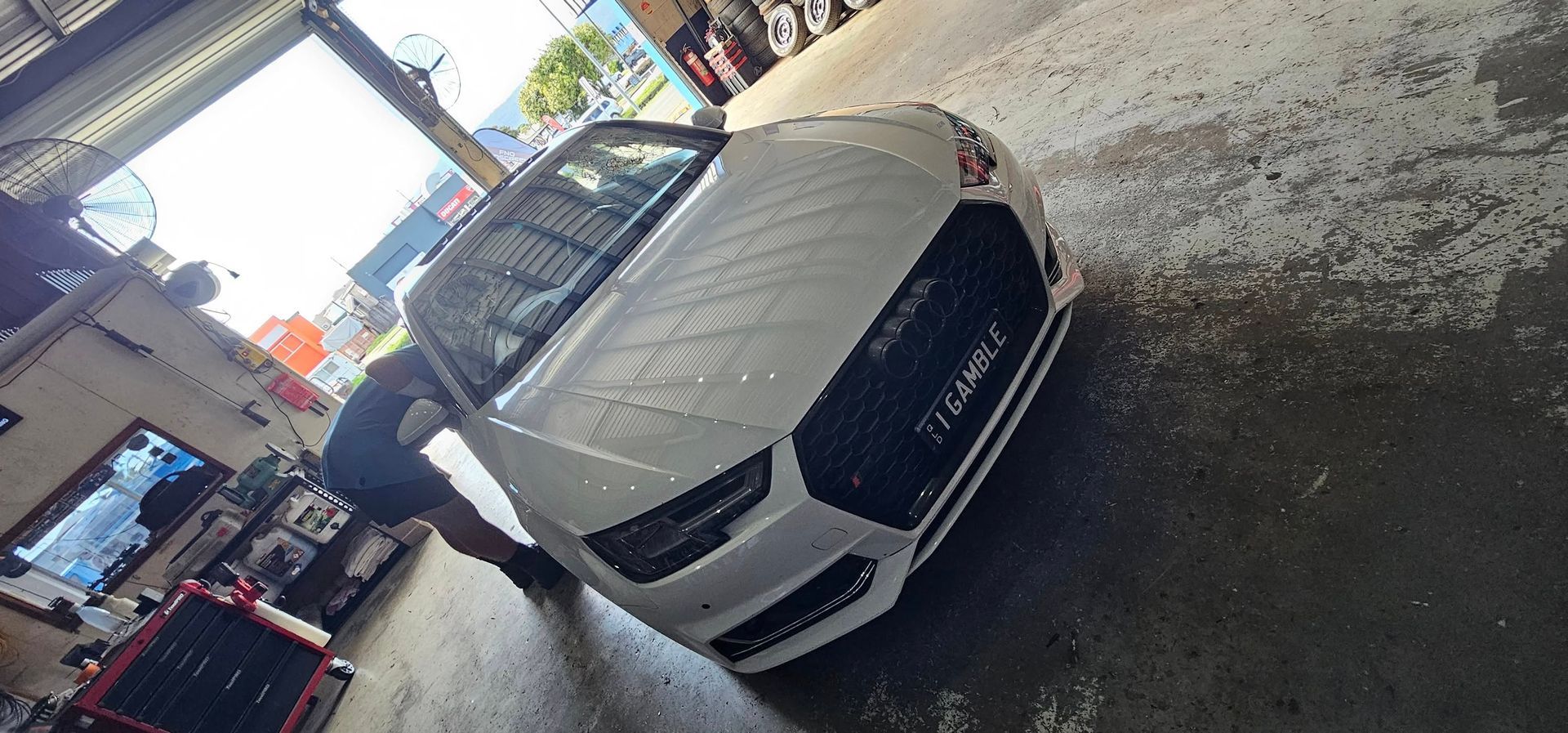 A Close up Of a Car Windshield with A Hole in It — FNQ Windscreens in Bungalow, QLD