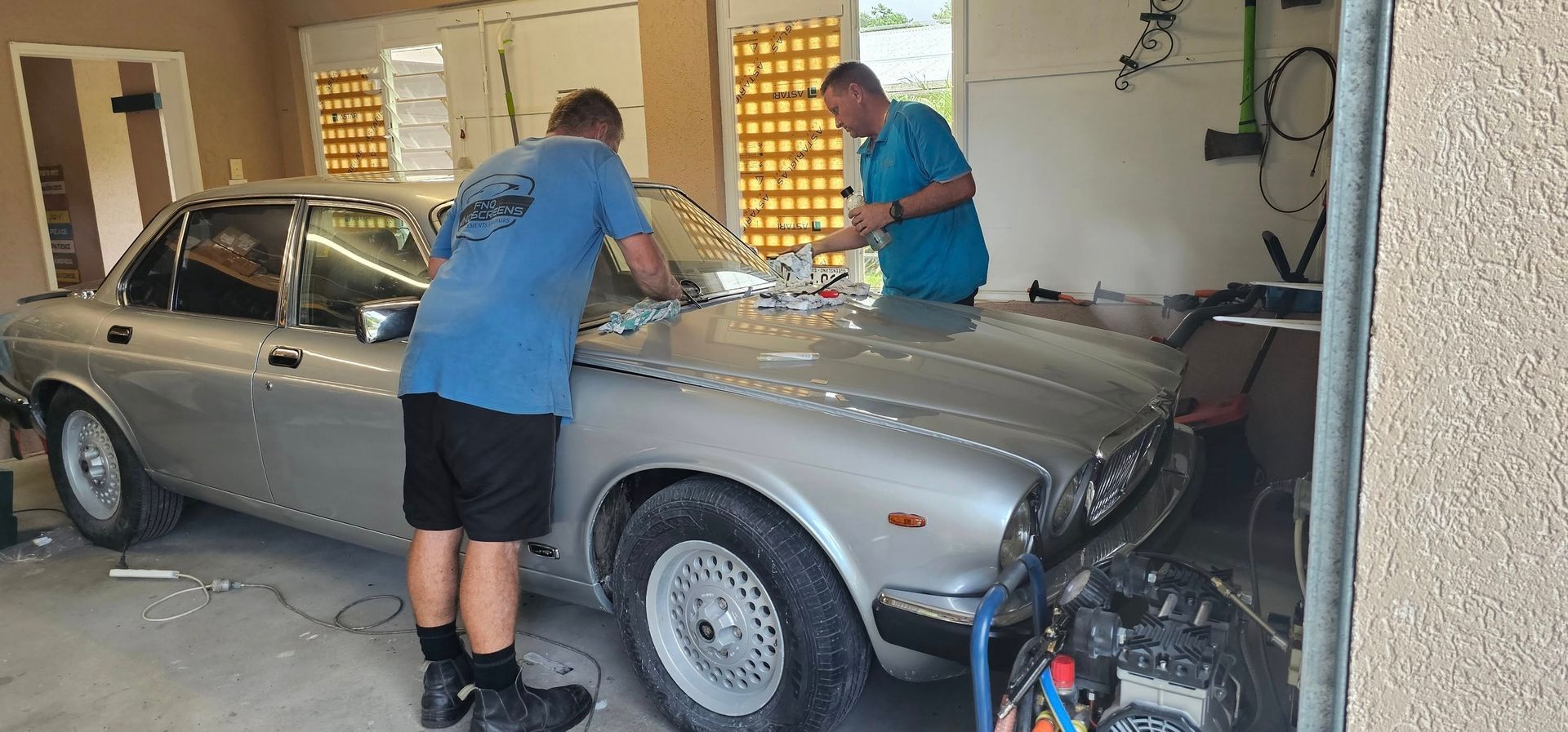 A Close up Of a Car Windshield with A Hole in It — FNQ Windscreens in Bungalow, QLD