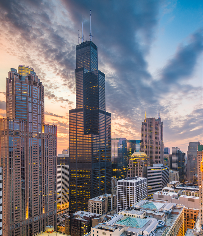 A city skyline with a very tall building in the middle