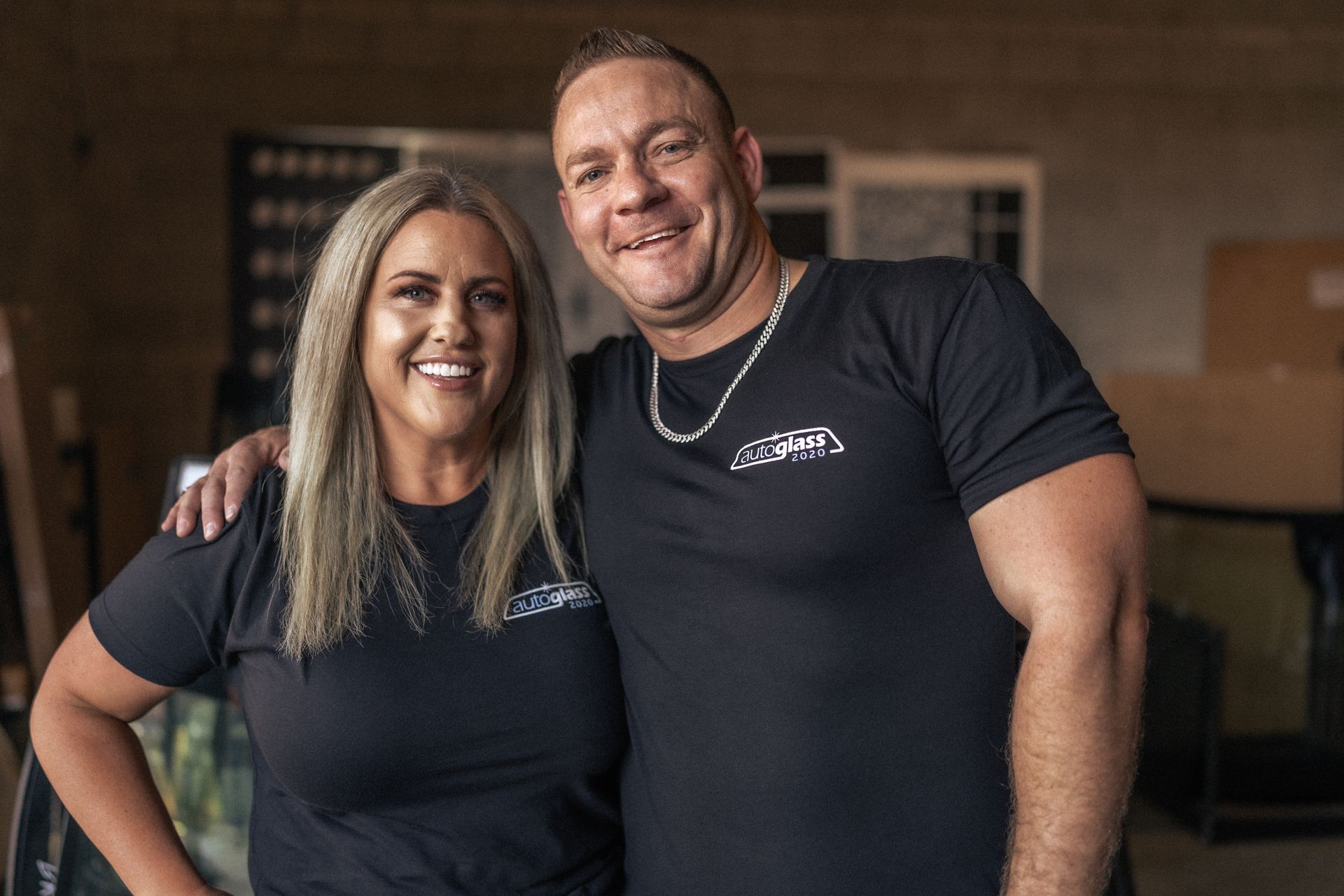 A man and a woman are posing for a picture together.