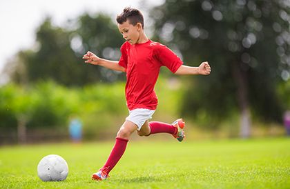 A Kid Playing Soccer