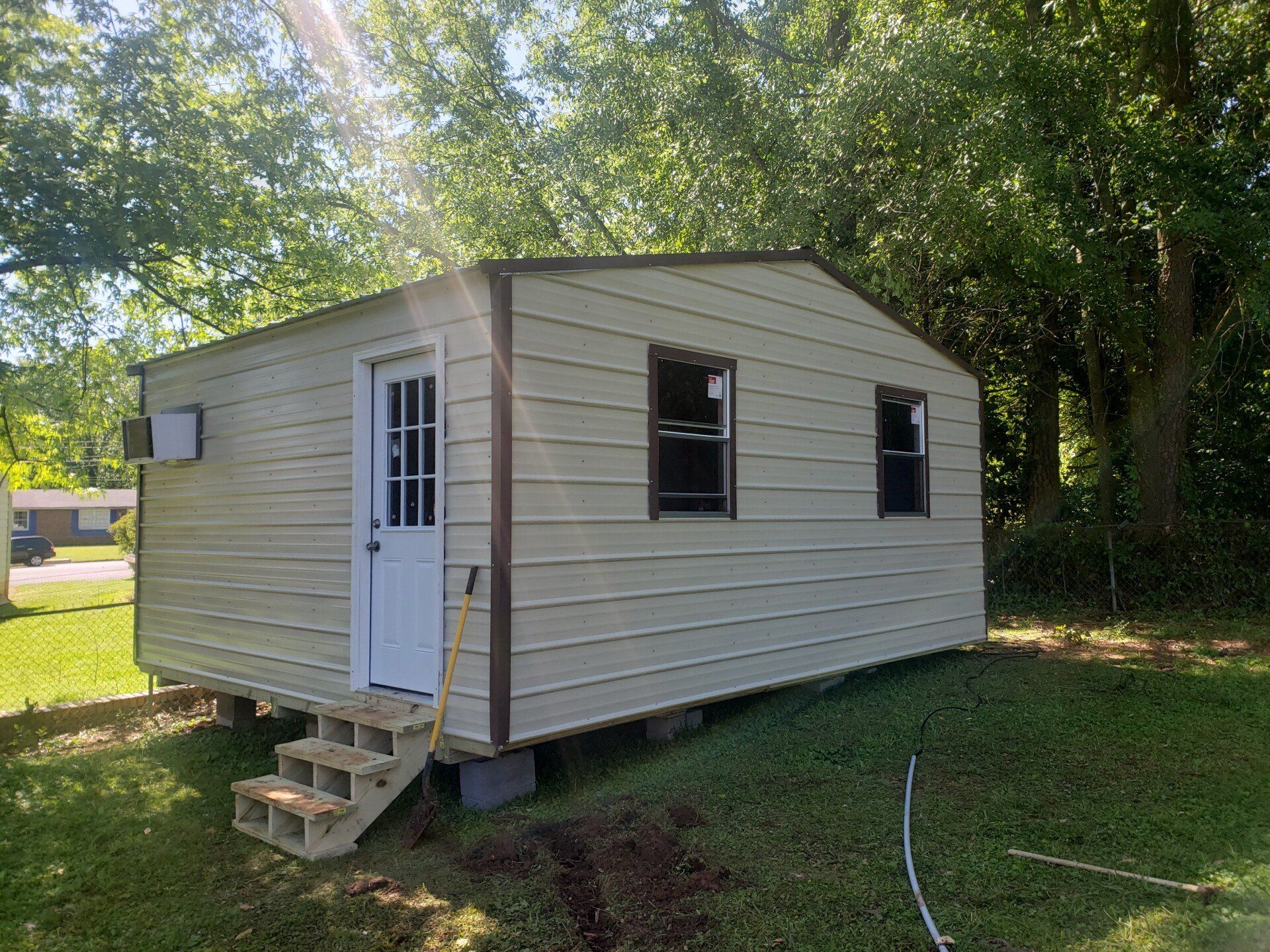 Portable house under the tree — Huntsville, AL — Affordable Portable Buildings