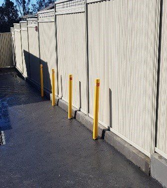 tall cream colored fence