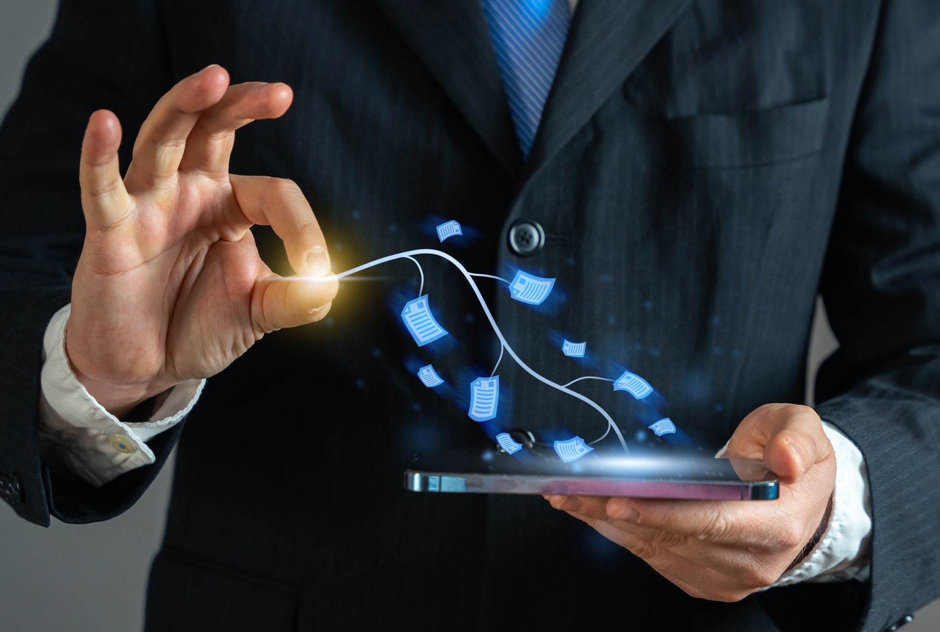 Businessman holding phone, gesturing, data streaming from phone, digital connection.