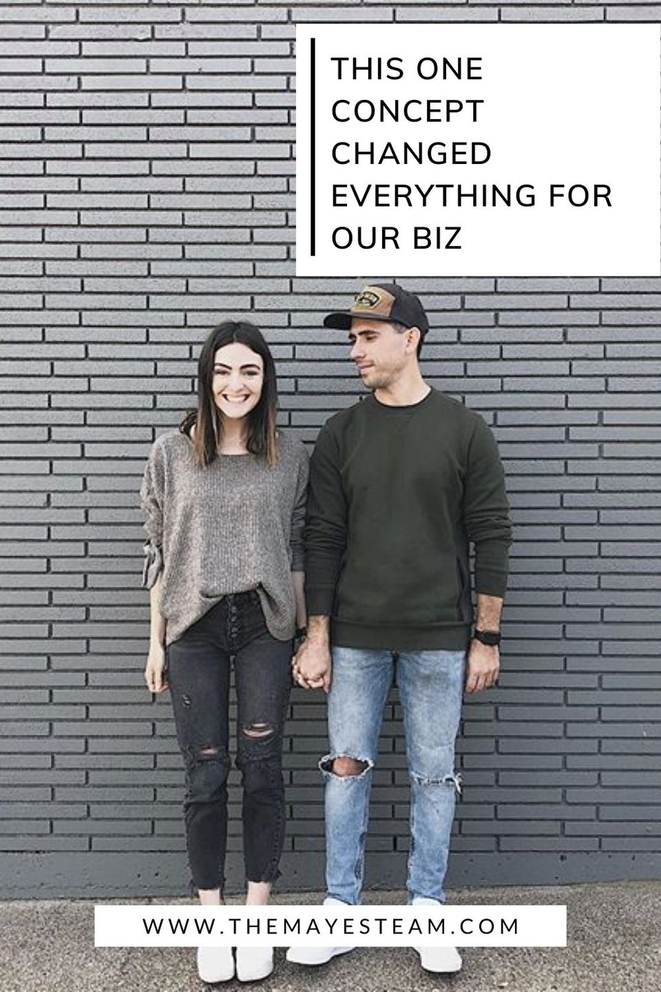 Debbie and Gabriel Mayes hold hands and smile while standing against a grey brick wall. Text overlays the image that reads this one concept changed everything, how to build a million dollar click funnel.