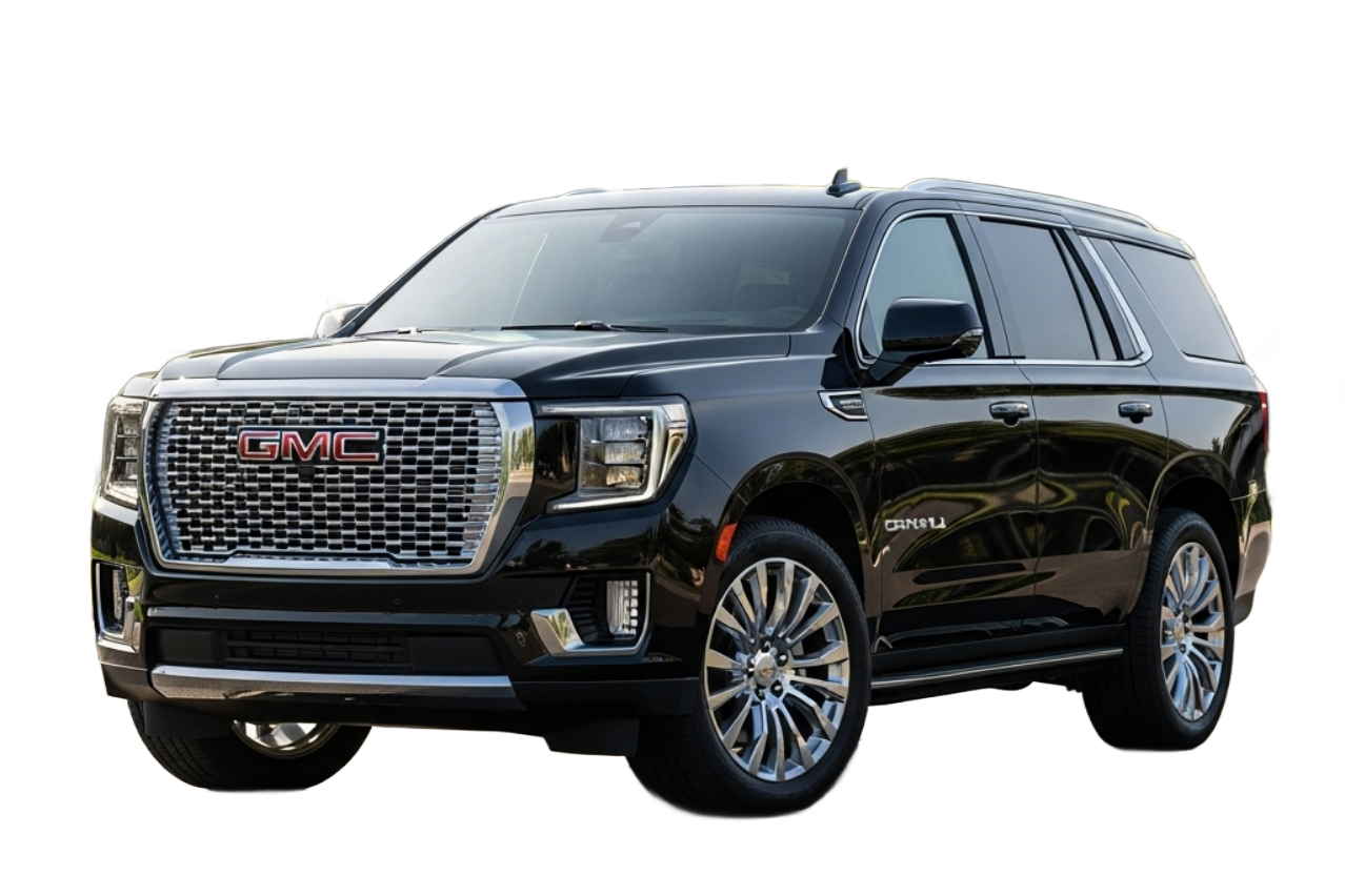 Black GMC Yukon SUV with chrome grille and wheels.