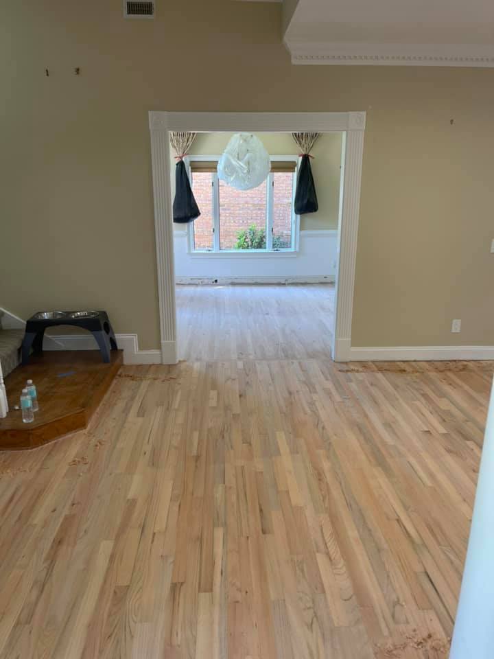 Floor After Staining With Light Varnish — Jacksonville, FL — Handy Andy Flooring