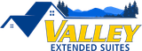 valley extended suites logo with a house and mountains in the background