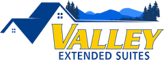 valley extended suites logo with a house and mountains in the background