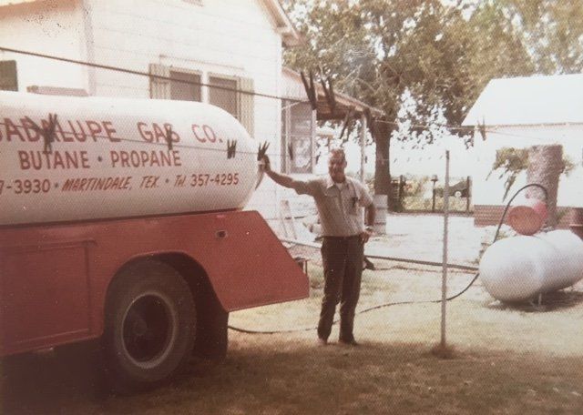 Man Beside A Tanker | Martindale, TX | Martindale Guadalupe Gas Company