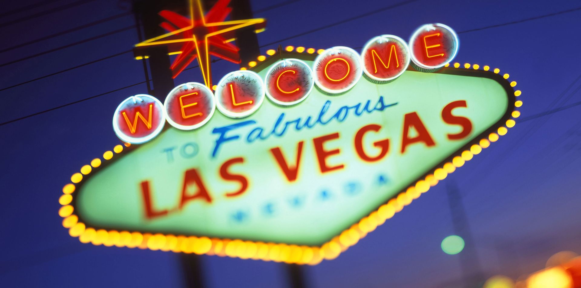 A neon sign that says welcome to fabulous las vegas