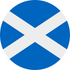 Blue circle with a white diagonal cross, representing the Scottish flag.