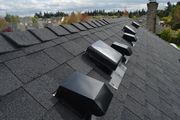 A roof with a lot of vents on it