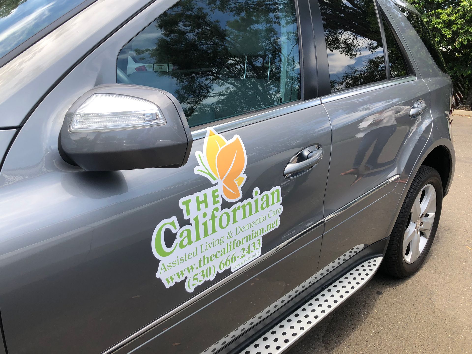 A car with a sticker on the side that says the californian