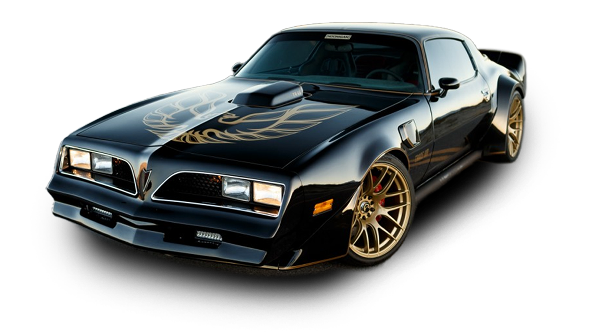 a black car with a gold wing on the hood