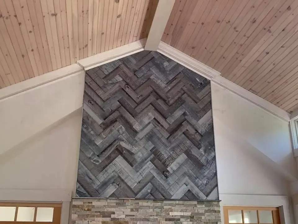 A fireplace with a herringbone pattern on it