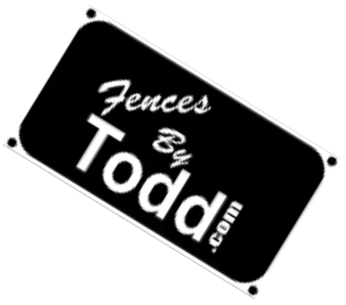 Black tilted sign reading “Fences By Todd.com” in white text on a white background